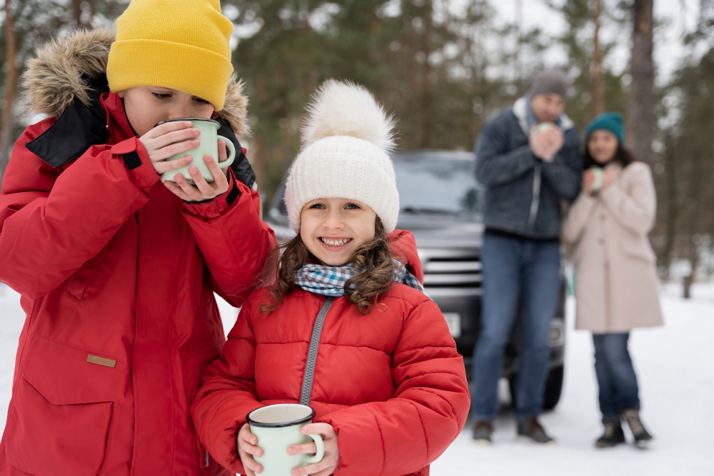 A family drinking cups of hot chocolate