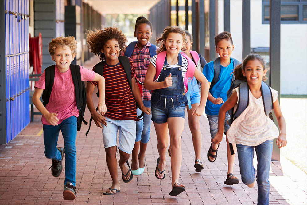 Kids running to school